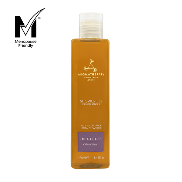 Shower oil bottle with Aromatherapy Associates branding on a white background