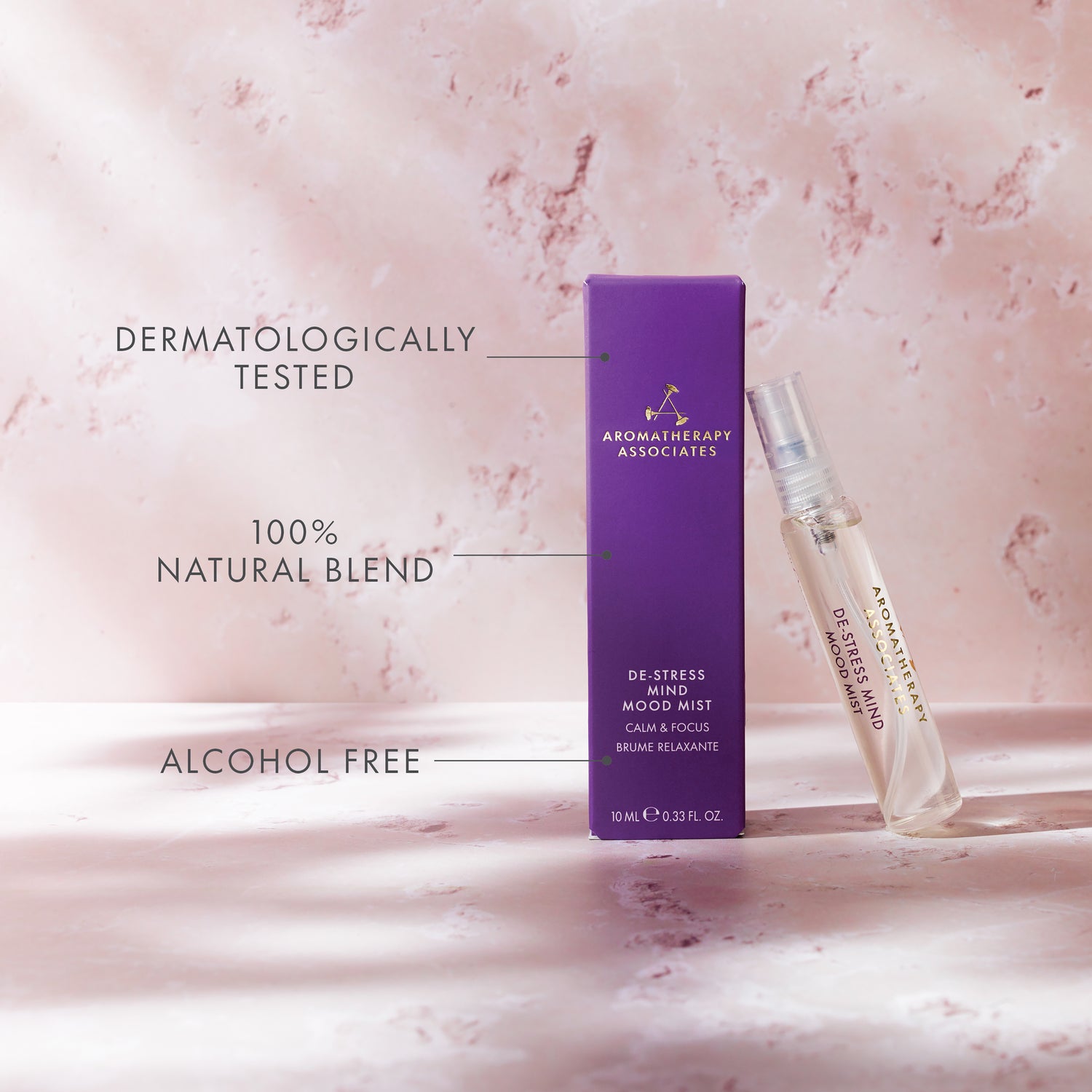 Aromatherapy Associates De-Stress Mind Mood Mist on a pink marble background