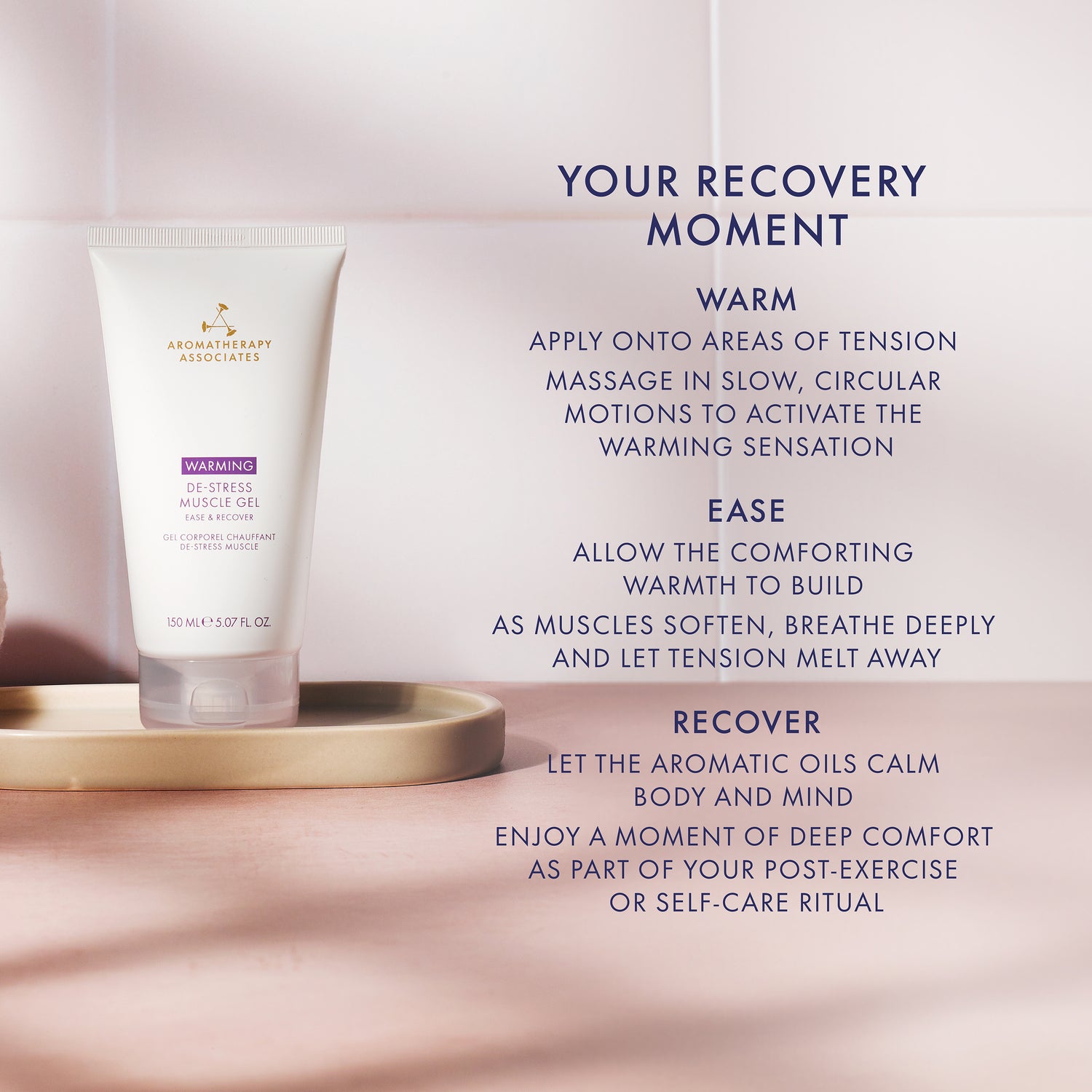 Aromatherapy Associates Warming De-stress muscle gel  on a pink surface with text on recovery moments.