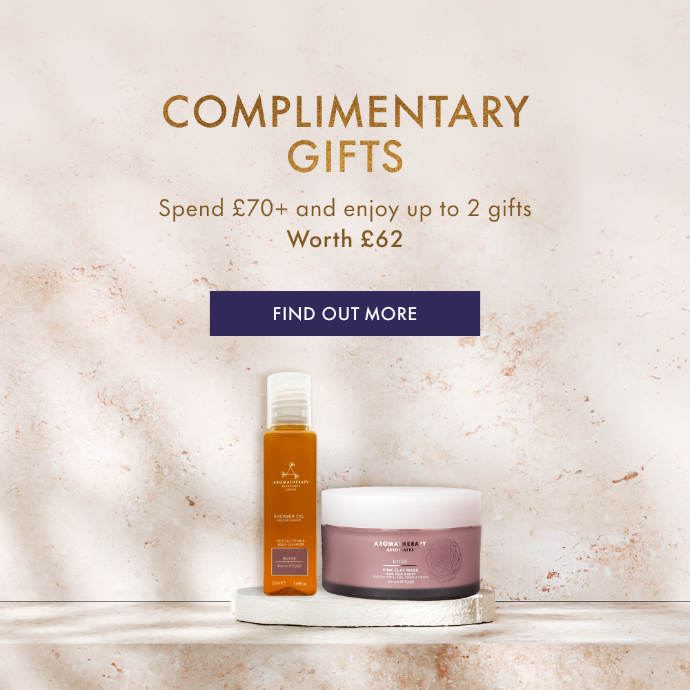 Two skincare products on a shelf with promotional text about complimentary gifts.