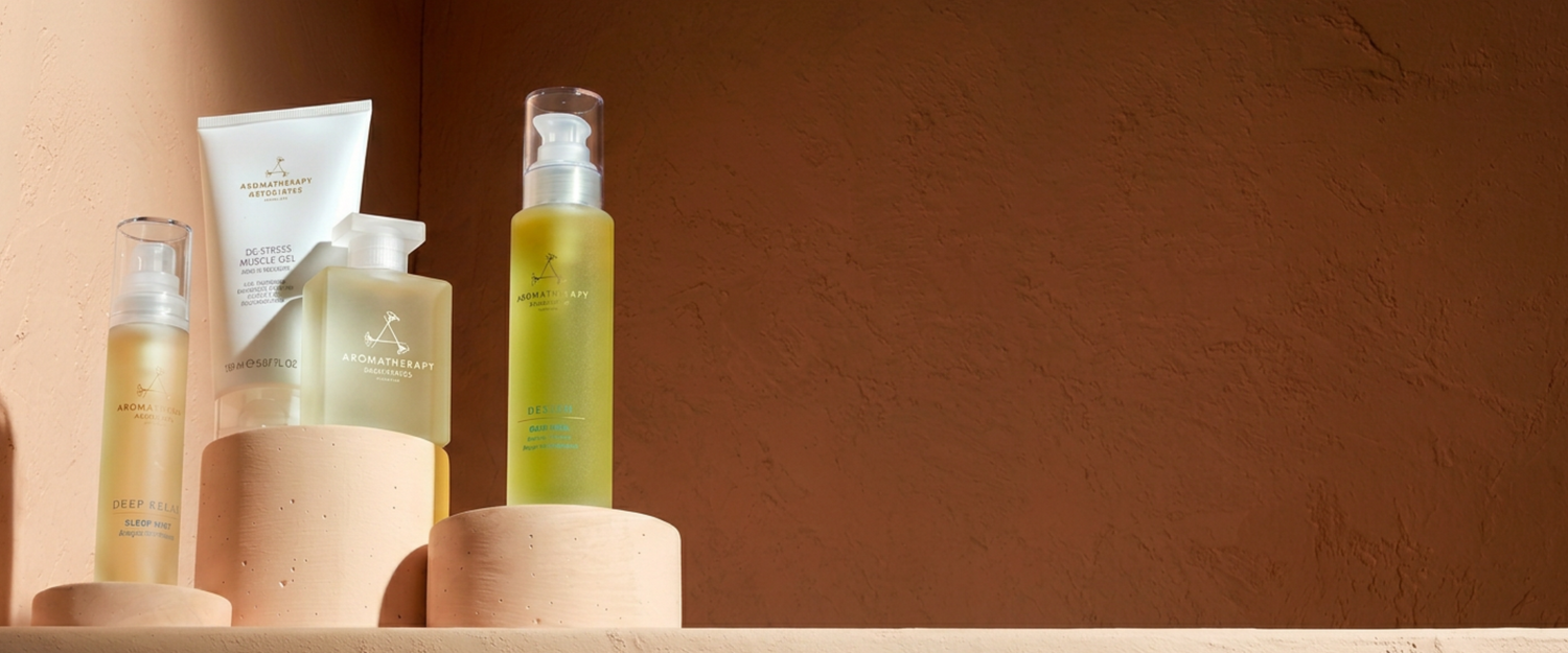 Skincare products on a wooden surface with a brown background
