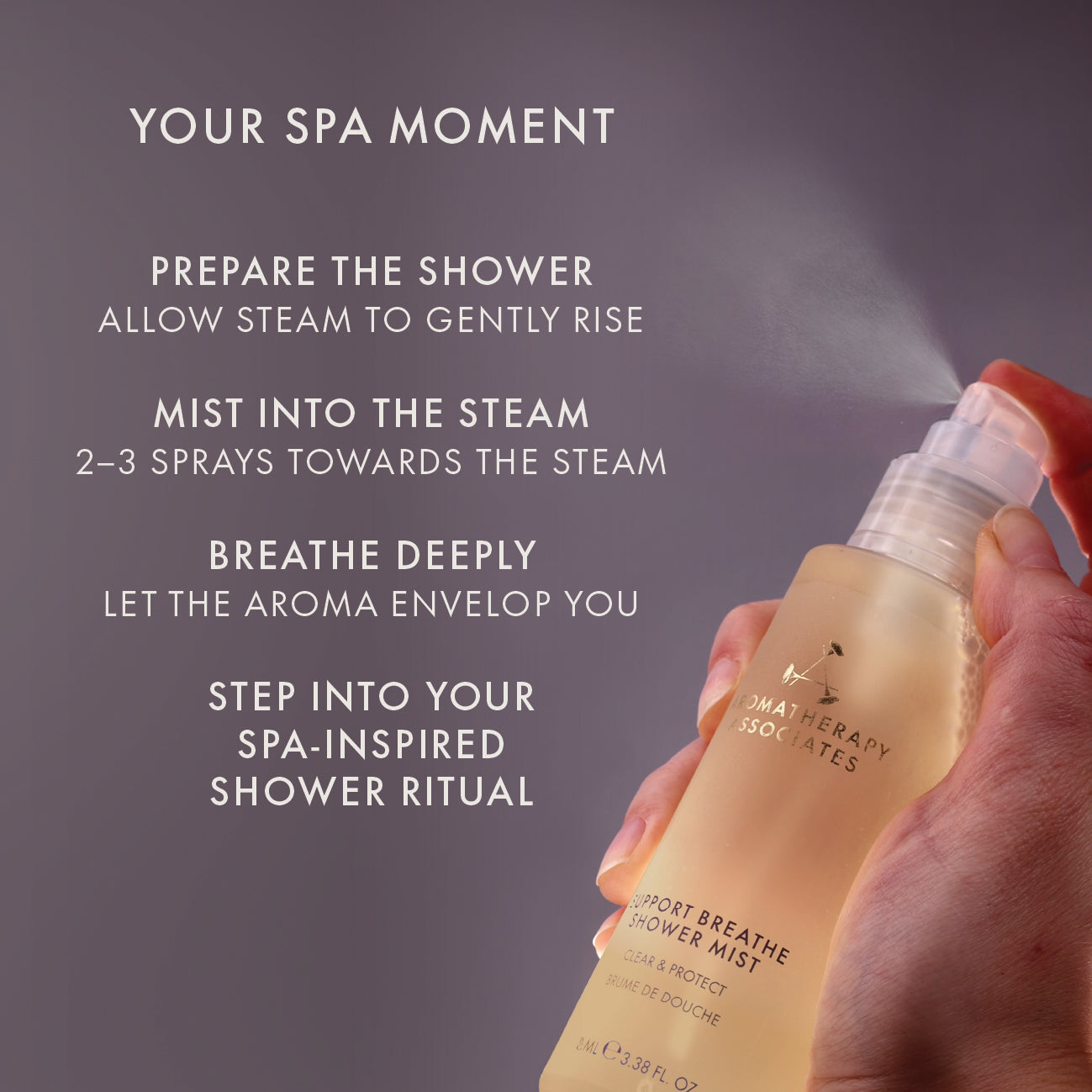 Hand holding a bottle of 'Support, Breathe, Shower Mist' with text on a purple background