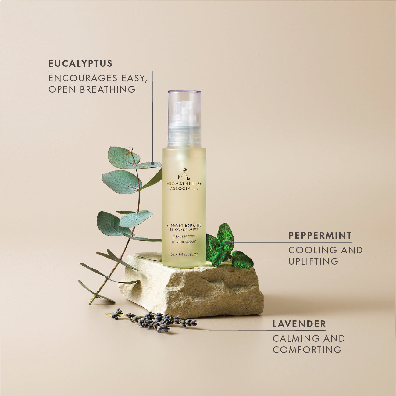Bottle of Support Breathe Shower Mist with eucalyptus, peppermint, and lavender on a beige background 
